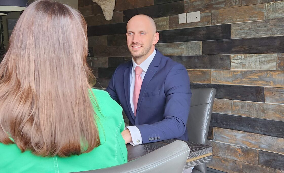 Greg in Meeting Greg west - in meeting with a client