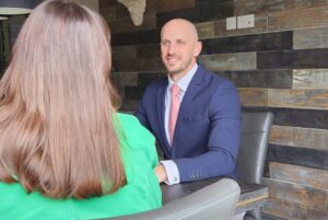 Greg west - in meeting with a client